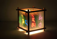 Tibetan Mantra Rotating Kids Bedside Table Lamp by Magic Lamp